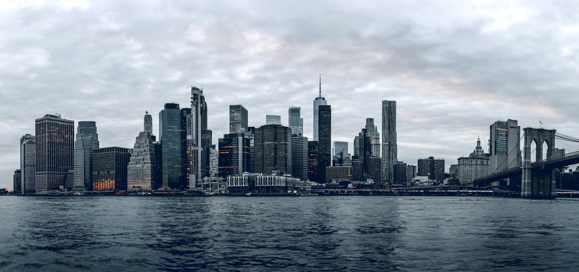 Lower Manhattan skyline beneath an overcast sky